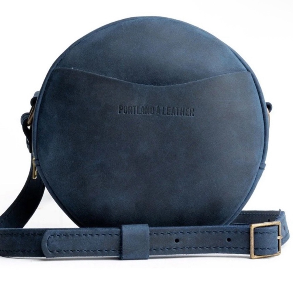 Portland Leather Goods Small Circle Crossbody Bag for Women in Blue.